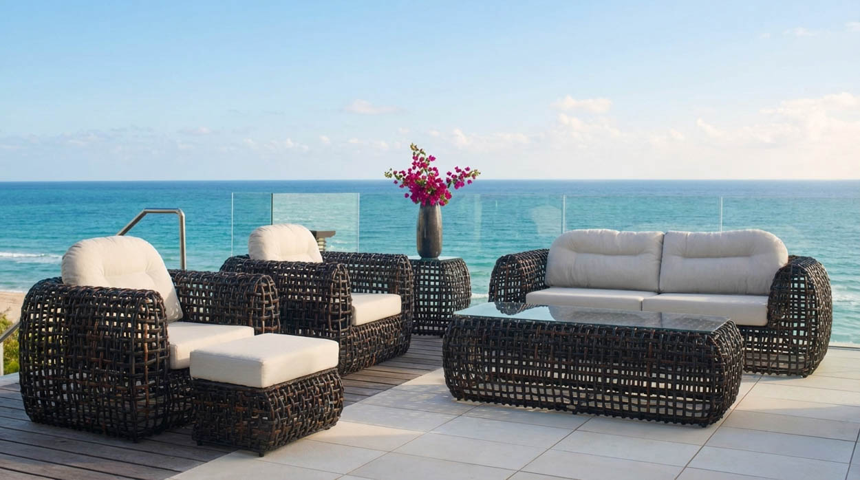 Wicker outdoor sofa set overlooking the ocean in North Florida, ideal for upscale patio and terrace furniture installations.