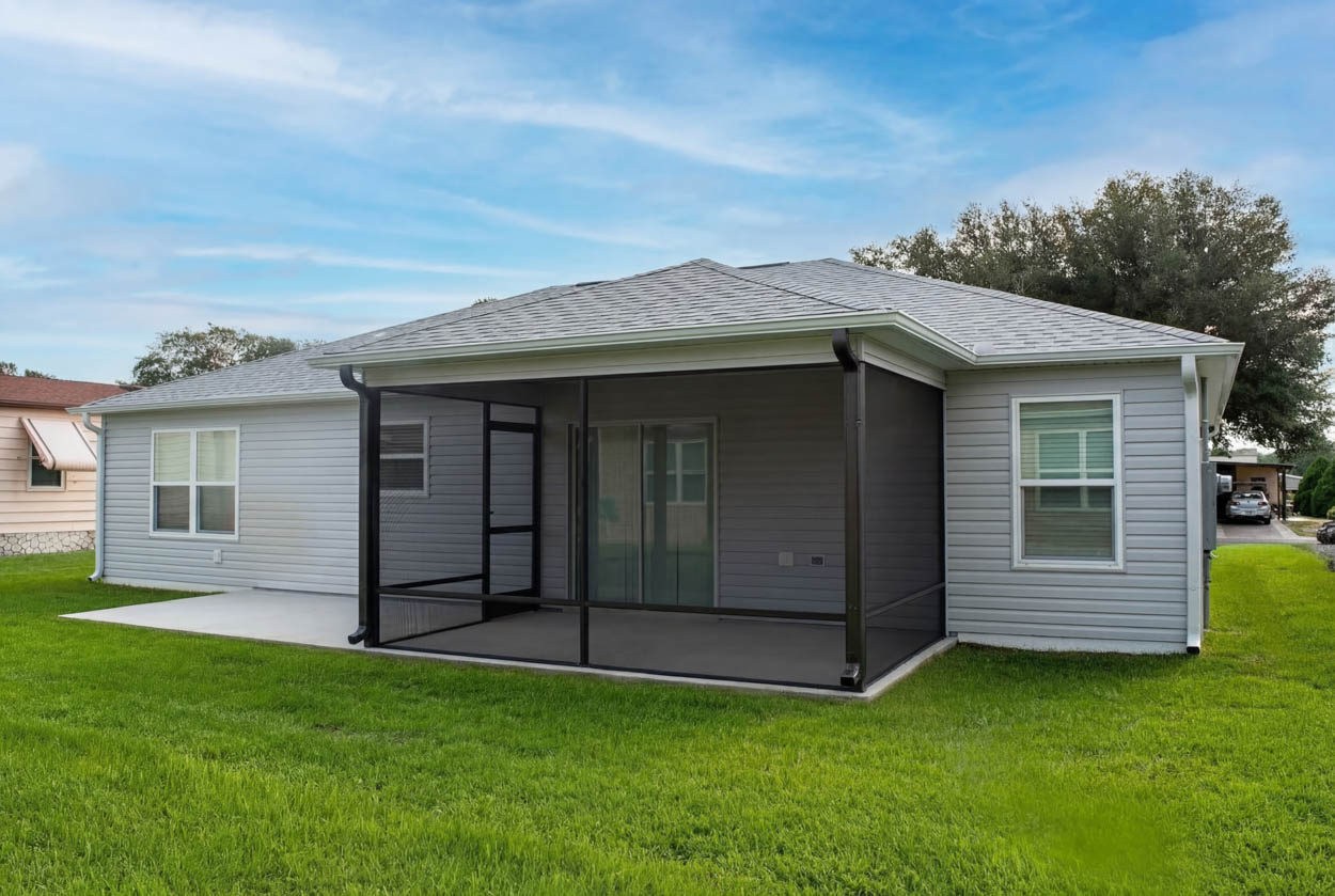 Professional patio screen enclosure installation designed to improve comfort, airflow, and insect protection for Florida residential properties.