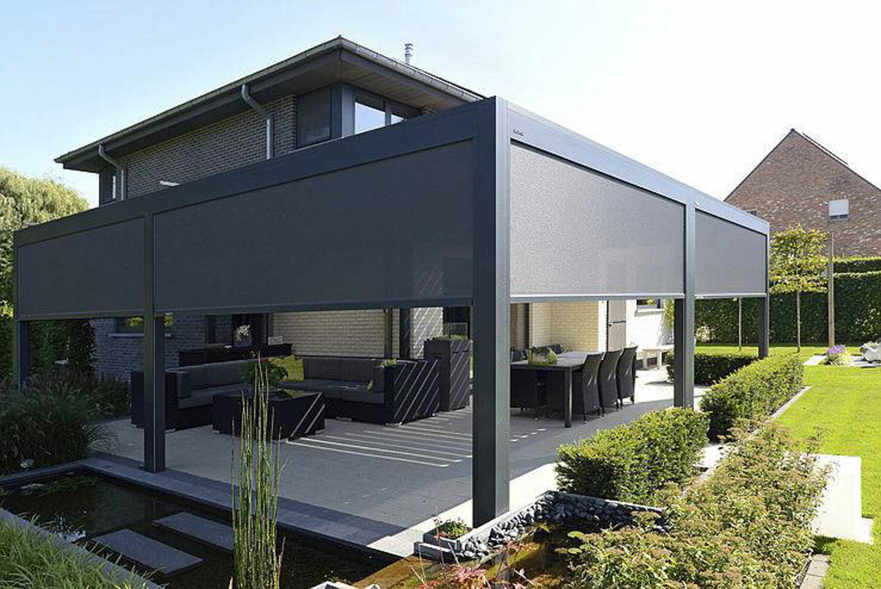 Contemporary pergola with integrated motorized retractable screens, enhancing comfort and usability of outdoor spaces in South Florida residential properties.