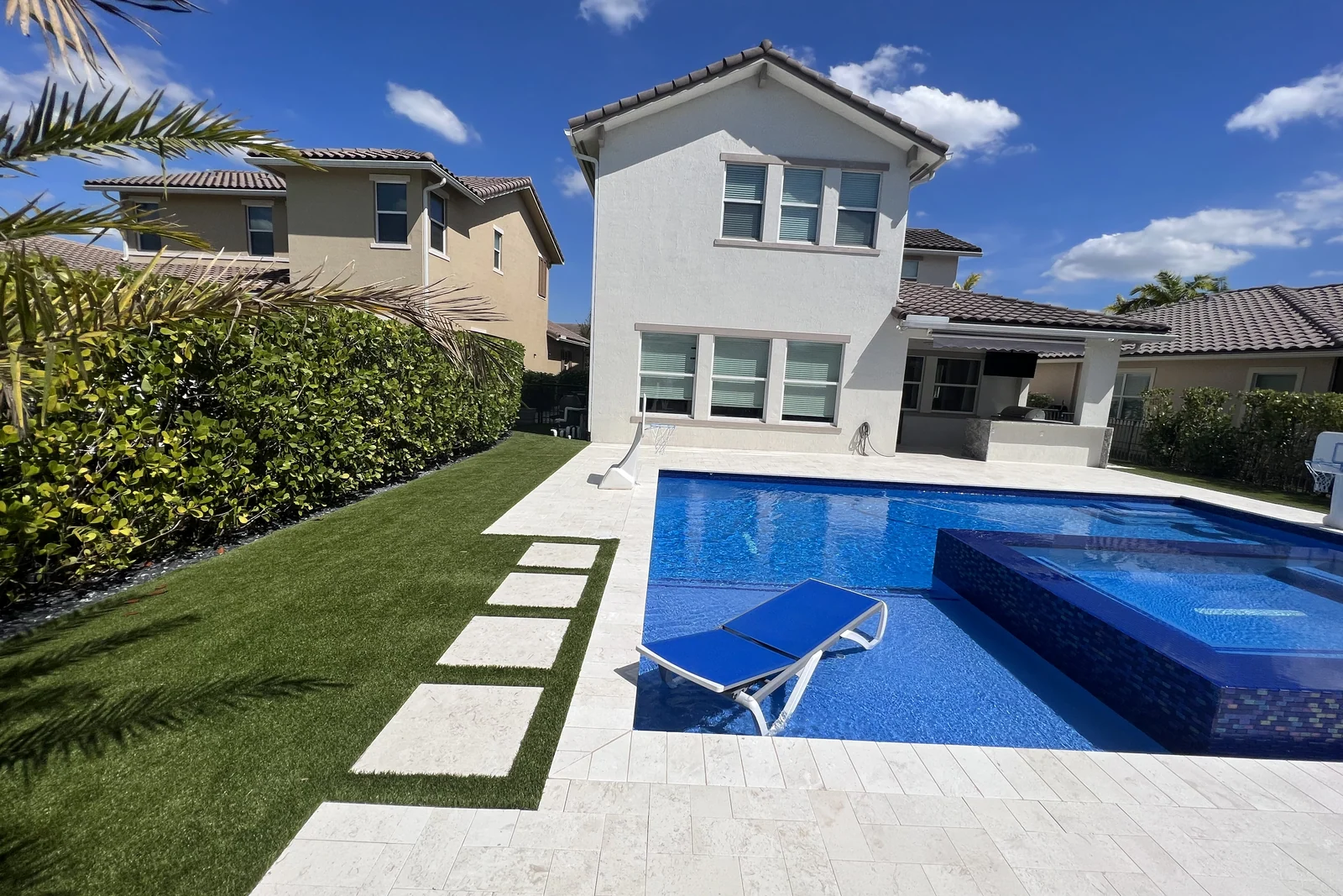 Completed backyard pool with raised spa