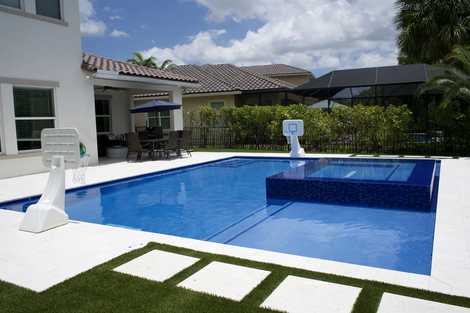 Completed backyard pool with raised spa