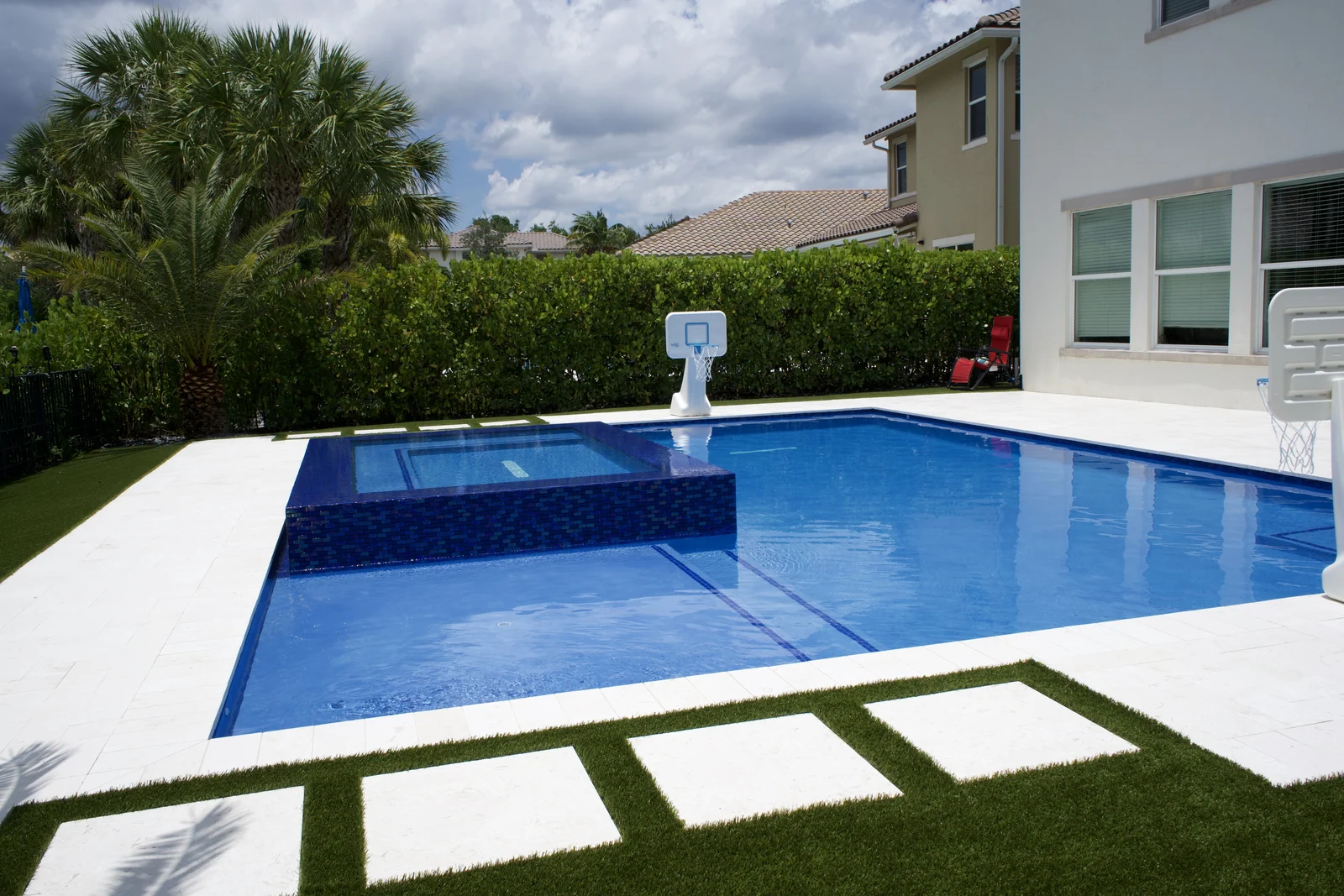 Completed backyard pool with raised spa