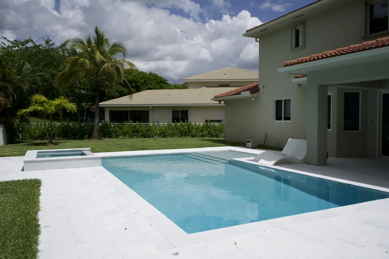 Completed backyard pool with raised spa