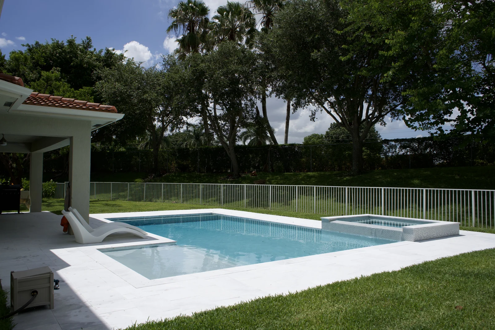 Completed backyard pool with raised spa